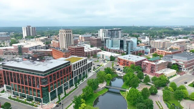 Aerial View of Kalamazoo Downtown Skyline and Green Spaces Tracking Shot