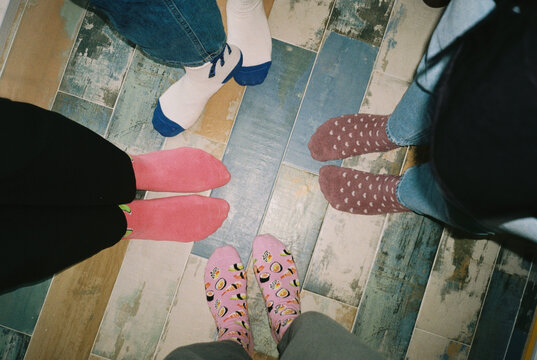Feet in colorful socks