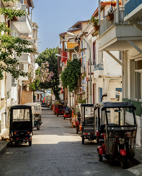 Narrow Street with Electric Rickshaws

