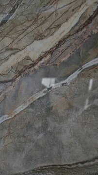 Trendy porcelain tile stone with luxury background stone texture. Kitchen countertops with modern interior design and counters close up