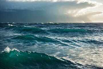 Fototapeta premium Person surfing on a wave in the ocean, suitable for use in travel, adventure, or outdoor recreation images