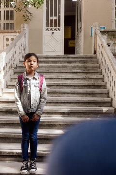 11 year old girl on the school porch