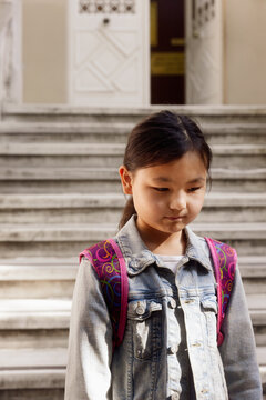 11 year old girl on the school porch