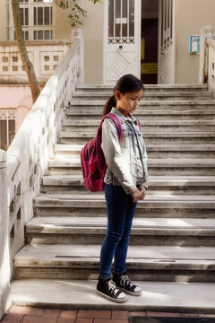 11 year old girl on the school porch