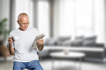 Fototapeta premium Happy man relaxing in room at home.