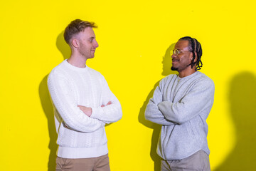 Two young professionals having a friendly conversation