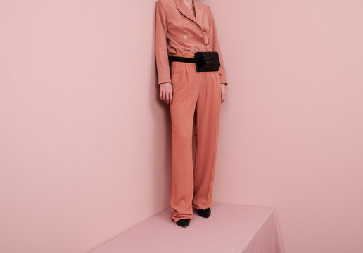 Fashion Model Wearing Pink Suit and Black Accessories