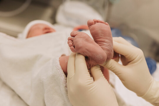Newborn Baby heart shaped feet placement - Powered by Adobe