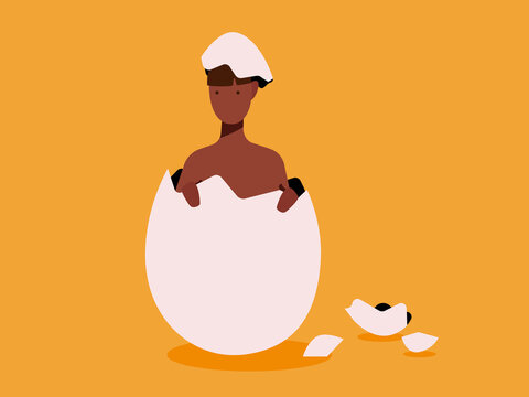 Black woman coming out of hatched egg in orange studio