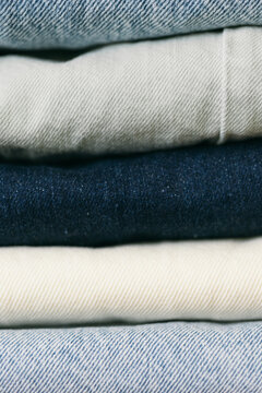 Folded jeans on a chair