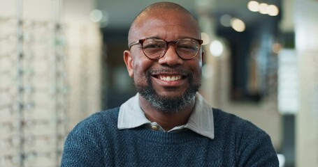 Man, face and optometry in choosing glasses for eye care, medical specialist or consultation at optometrist clinic. Male person, spectacles and portrait in ophthalmology center by size, frame or lens