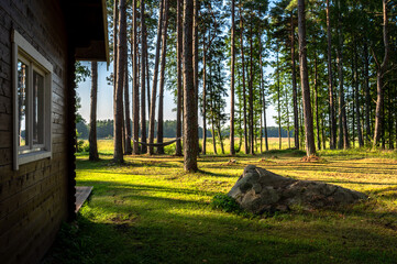 Cabin by the woods at sunset in Hiiumaa island, Estonia