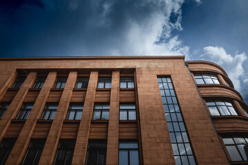 Facade of a 1930s business building in Riga, Latvia, featuring modernist architecture typical of the era.