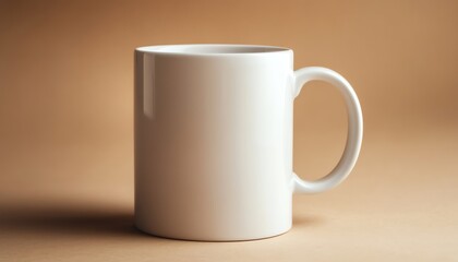 Fototapeta premium White Ceramic Mug with Handle on Tan Background