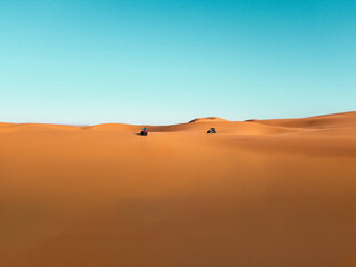 Quad Bikes Riding the Dunes of Great African Sahara Desert