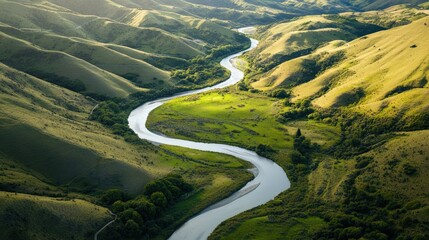 Serene River Winding Through Rolling Hills