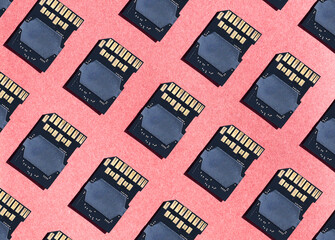 Pattern of Memory Cards on a Pink Background