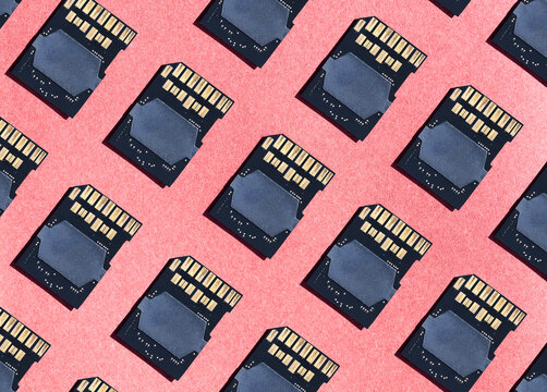 Pattern of Memory Cards on a Pink Background