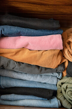 Folded pile of jeans and pants