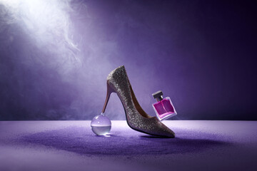 Unbranded perfume bottle standing on high heels in smoke. 