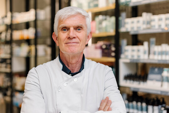 Portrait of a confident drugstore professional in a pharmacy setting