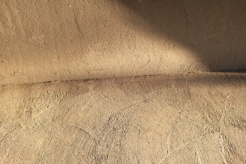 Minimal brutal urban architecture concrete wall & golden hour sunlight