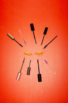 Long beauty lashes and different makeup mascaras and hard flashlight
