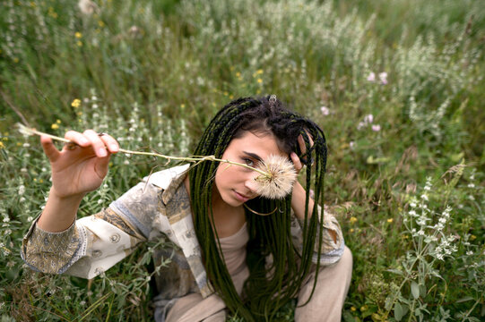 
portrait of a beautiful brunette with pigtails