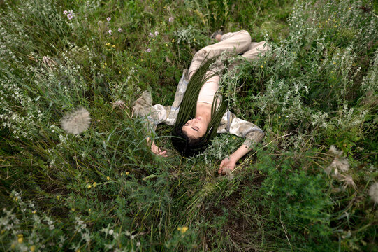 
portrait of a beautiful brunette with pigtails