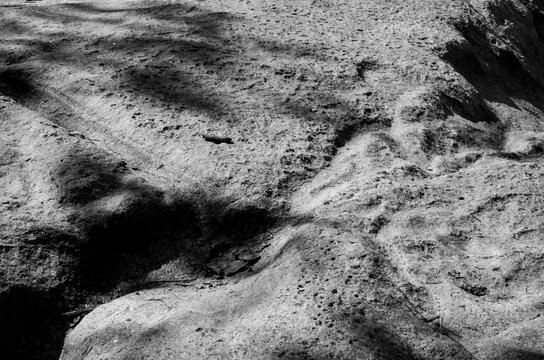 Sandy solid ground in black and white