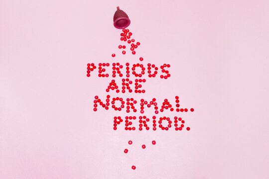 Menstrual cup and wordplay text "periods are normal. period."