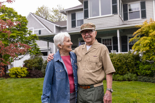 Senior  Veteran Portrait at home  with wife family