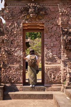 Woman in a beatiful temple in Bali