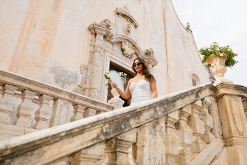 Elegant Woman on Stone Staircase