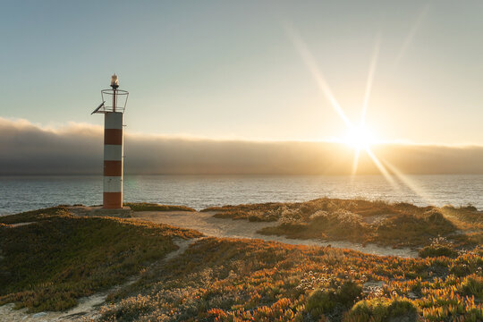landscape of a lighthouse by the sea