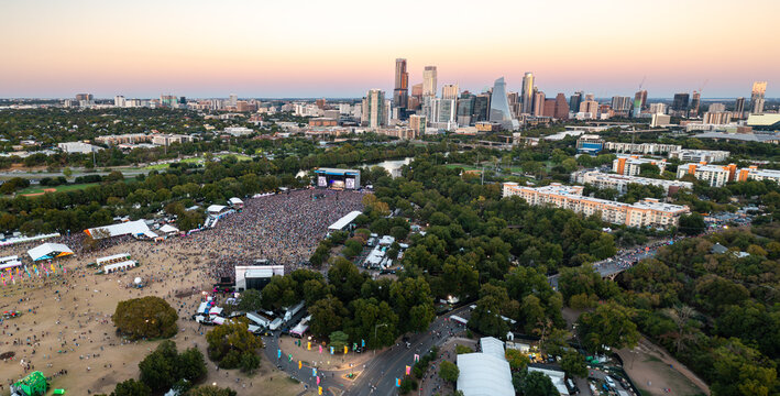 Aerial view of the Austin City Limits music festival with Austin skyline in the background