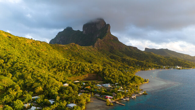 Mount Otemanu seen on tropical island Bora Bora in French Polynesia. The iconic volcano is a dramatic tourist destination in paradise. 