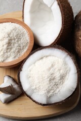 Coconut flour and fresh fruits on table, flat lay