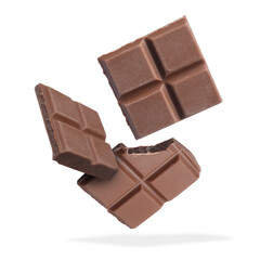 Pieces of sweet chocolate falling on white background