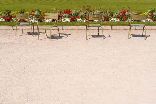 Green chairs at the gardens in Paris