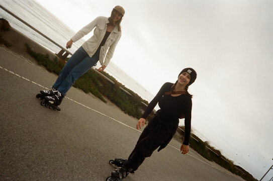 Friends rollerblading together 