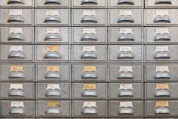 Organized Storage Cabinet with Labeled Drawers