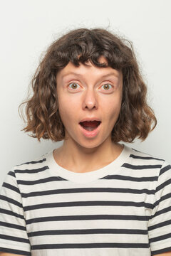 Young woman with surprised expresion