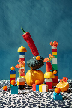 Colorful Arrangement of Fruits and Blocks.