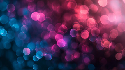 Dreamy bokeh effect with vibrant pink and blue lights, creating a sparkling abstract background.