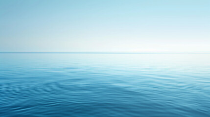 Obraz premium Tranquil Seascape with a Clear Sky and Soft Horizon at Dawn