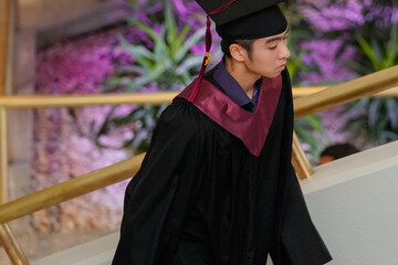 A student in his graduation gown