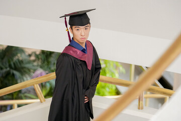 A student in his graduation gown