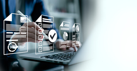 Businesswoman manage e-document system Online .Document management checking the version correct and...