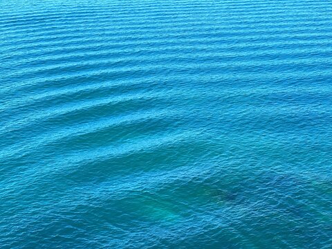 blue water ripples surface